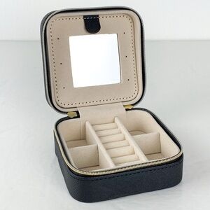 Travel jewelry box by French Connection black faux leather zip-up organizer